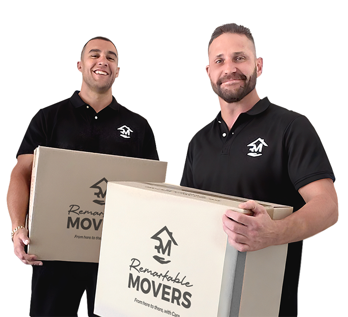 Professional movers in Auckland loading a truck